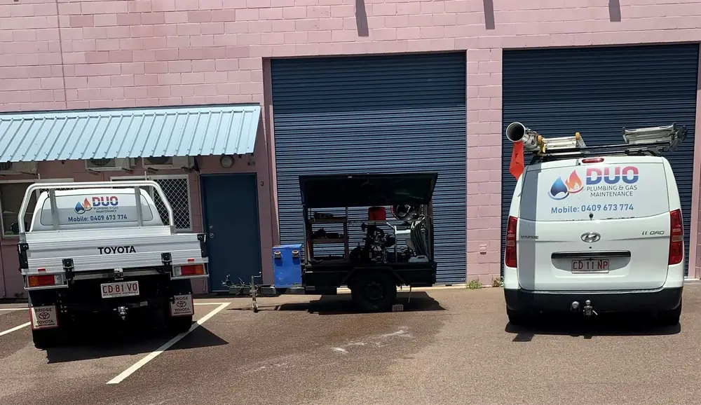 DUO Plumbing & Gas Maintenance vehicles and equipment outside the Coconut Grove workshop